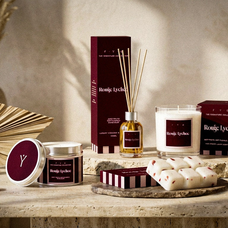 FYG Signature Collection Rouge Lychee candle, diffuser, tin candle and wax melts styled in a warm interior