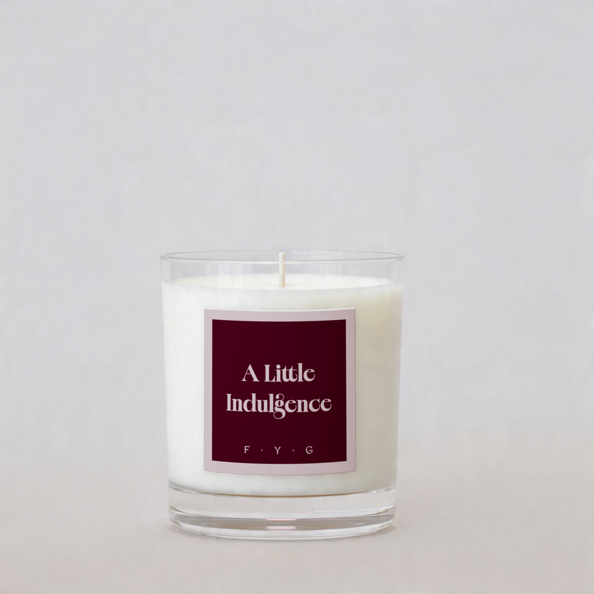 Rouge Lychee candle with A Little Indulgence Signature Mark label