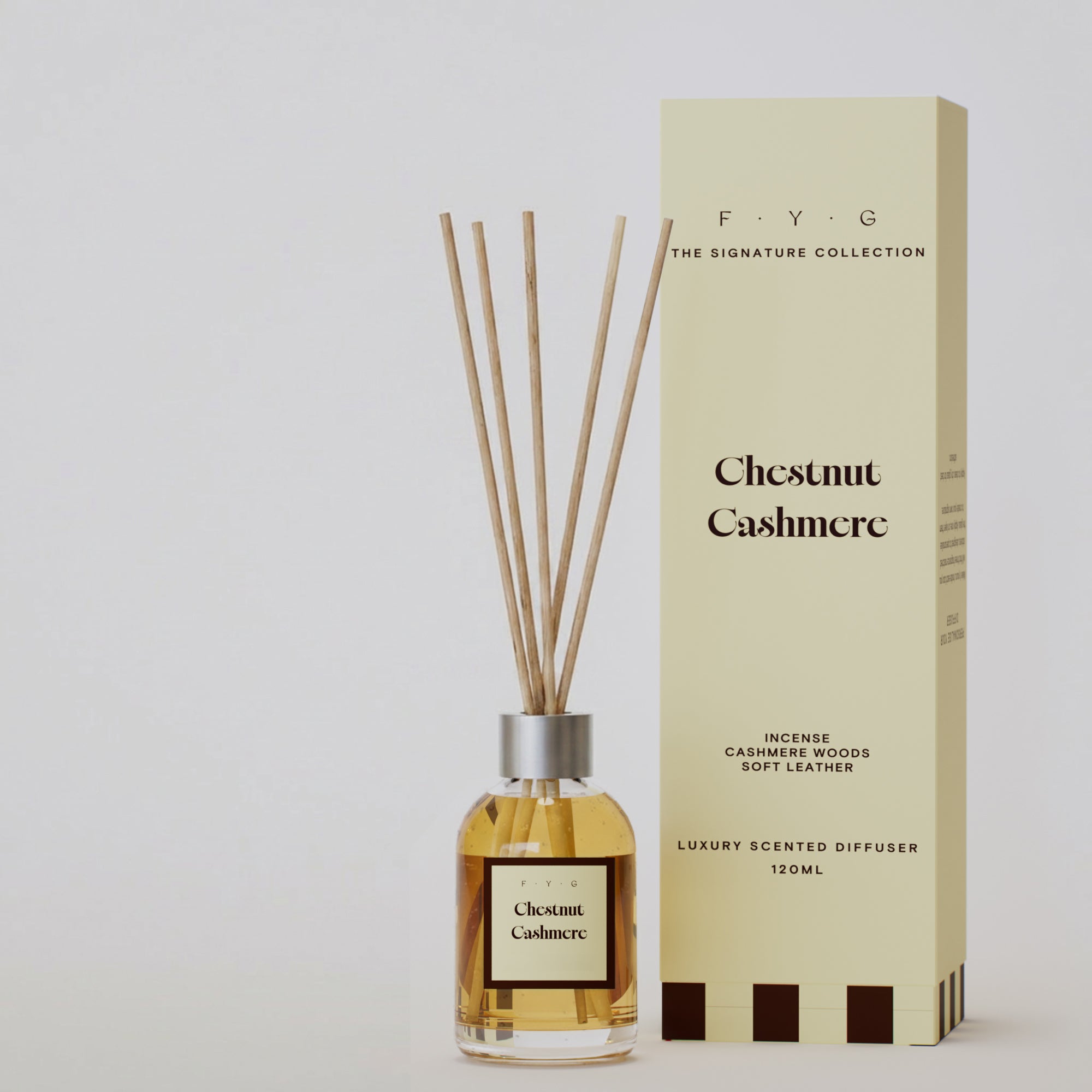 Chestnut Cashmere reed diffuser with reeds and cream Signature Collection gift box