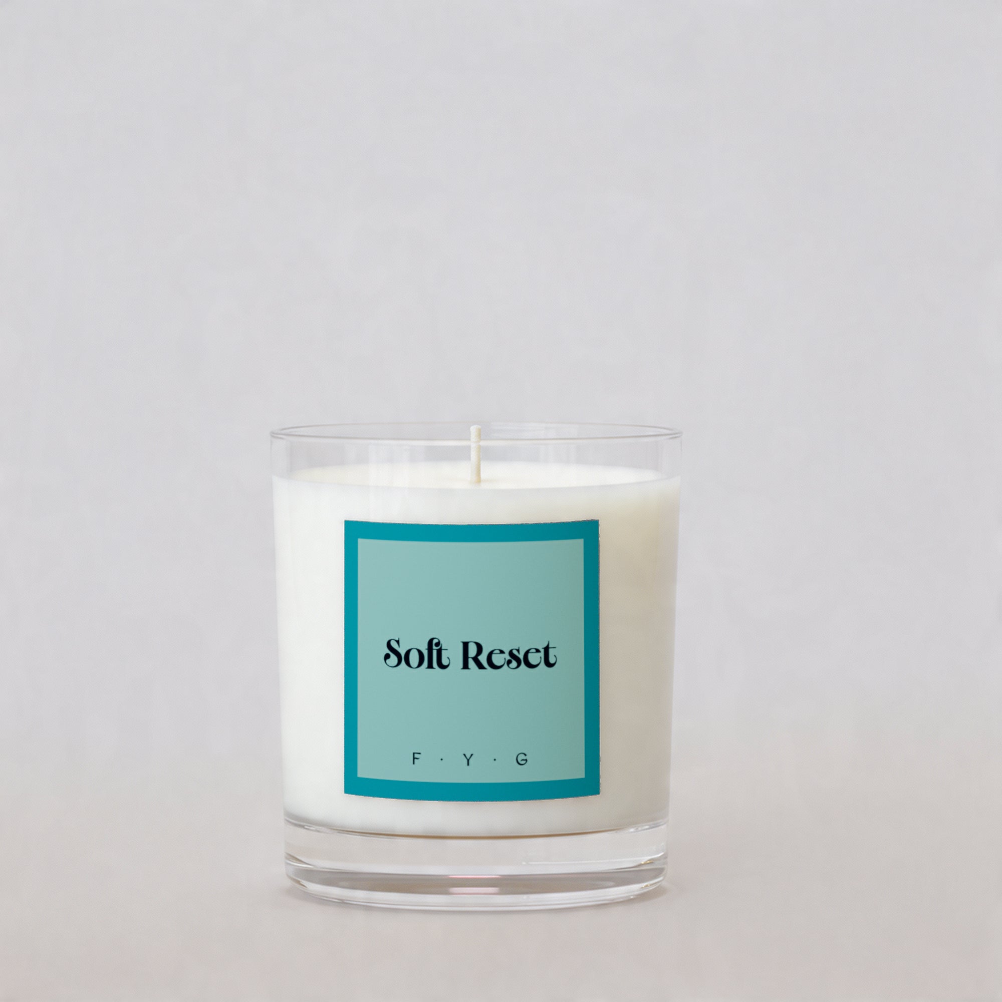 Arctic Lotus candle with Soft Reset Signature Mark label