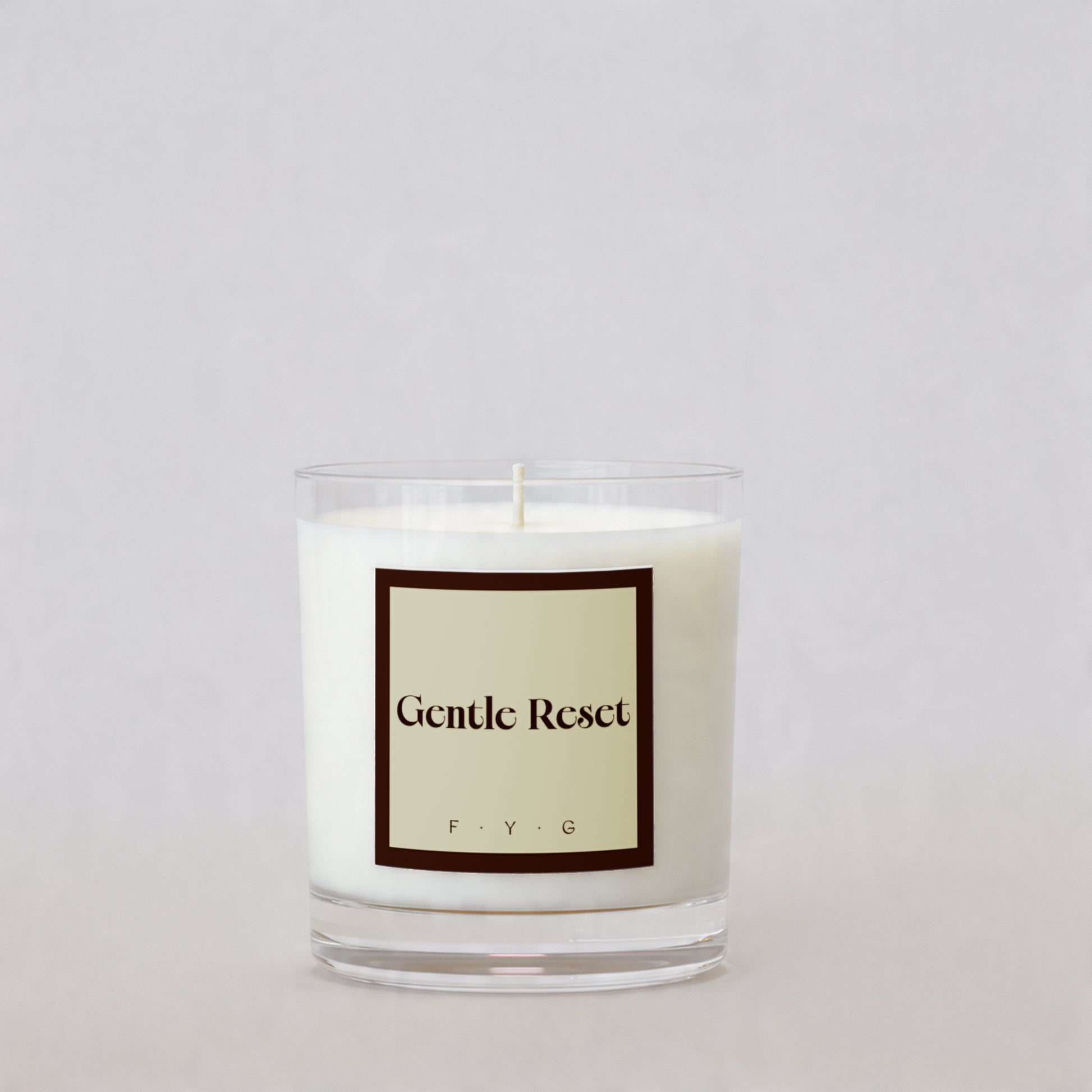 Chestnut Cashmere candle with Gentle Reset Signature Mark label