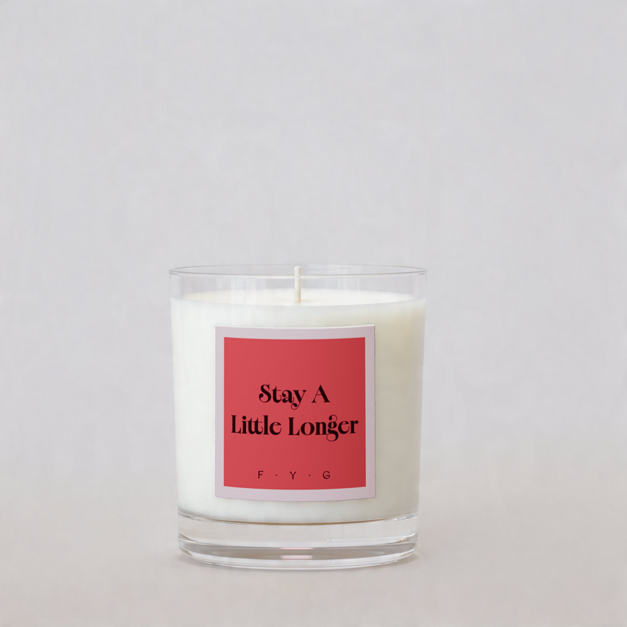 Velvet Ember candle with Stay A Little Longer Signature Mark label